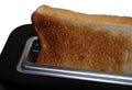 Toasted bread slice popping up from toaster Royalty Free Stock Photo