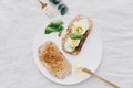 Toasted bread slices with adjacent butter Royalty Free Stock Photo