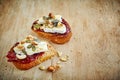 Toasted bread slices with jam and brie cheese Royalty Free Stock Photo