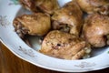 The toasted chicken thighs in the plate.