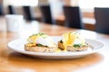 toasted english muffins with poached eggs and hollandaise sauce Royalty Free Stock Photo