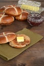 Toasted hot cross bun on green napkin Royalty Free Stock Photo