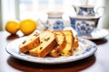 toasted panettone slices with butter on ceramic dish