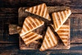 Toasted sandwich panini with ham and cheese Royalty Free Stock Photo