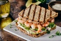 Toasted sandwich with prawns and avocado pear
