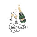 Toasting champagne glasses with congrats lettering