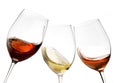 Toasting gesture red and white wine with splash, cheers close up with wine isolated