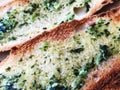 Toasts with basil and garlic close-up on a plate. Royalty Free Stock Photo