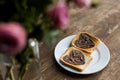 toasts with chocolate paste in shape of hearts on wooden table, valentines Royalty Free Stock Photo