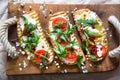 Toasts with egg, aragula, tomato and cheese,French toast bread with veggies Royalty Free Stock Photo