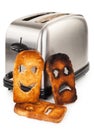 Toasts with smiley face in toaster Royalty Free Stock Photo