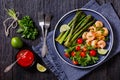 Toasty asparagus with fried prawns, lime and salad