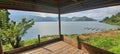 Toba lake with view mountain from wooden deck Royalty Free Stock Photo