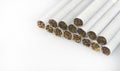 Tobacco in cigarettes with a brown filter Royalty Free Stock Photo