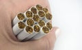 Tobacco in cigarettes with a brown filter Royalty Free Stock Photo