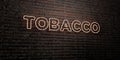 TOBACCO -Realistic Neon Sign on Brick Wall background - 3D rendered royalty free stock image