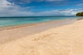 Tobago beach front seascape holiday word written in the sand Royalty Free Stock Photo