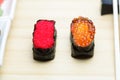 Tobiko and Ikura sushi on table Royalty Free Stock Photo