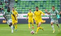 Tobol defender Aleksa Amanovic against Ferencvaros players Anderson Esiti and Kristoffer Zachariassen during UEFA Champions League