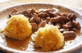 Tochitura is a traditional Romanian dish made from beef and pork served with eggs and polenta Royalty Free Stock Photo