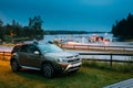 Tocksfors, Sweden. Car Renault Duster SUV Parked Near Lake Or River Landscape In Swedish Countryside Landscape. Summer