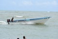 Fisherman Rides Fishing Pirogue in Saline Bay, Trinidad, West Indies