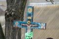 TOCUZ, MOLDOVA- 16 APRIL, 2018: Traditional cross in the cemetery celebrating the dead during Memorial Easter