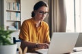 Today is the day I finally reach my goals. a young woman using a laptop while working from home.