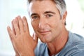 Today Im choosing serenity. Headshot portrait of a handsome mature man smiling while looking at the camera during the Royalty Free Stock Photo