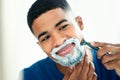 Today is important i need to be clean shaven. a young man shaving himself. Royalty Free Stock Photo