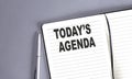 TODAY\'S AGENDA word on the notebook with pen Royalty Free Stock Photo