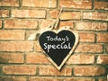 Today`s menu on heart shape chalkboard Royalty Free Stock Photo