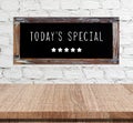 Today's special on vintage chalk board over cement wall and empt