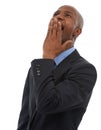 Today seems to be longer than usual...Studio shot of a tired-looking businessman  on white. Royalty Free Stock Photo