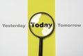 Today wording inside of Magnifier glass on yellow background for focus current situation , positive thinking mindset concept Royalty Free Stock Photo