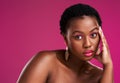 On todays menu well be serving looks. Studio shot of a beautiful young woman posing against a pink background.