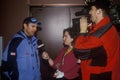 Todd Hayes, winner of Silver Medal in Bobsledding with reporters, 2002 Winter Olympics, Salt Lake City, UT