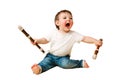 Toddler baby with a flute wind musical instrument on a studio isolated Royalty Free Stock Photo