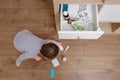 Toddler baby opened the cabinet drawer with pills and medicine. Child Royalty Free Stock Photo