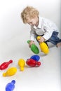 Toddler is bowling Royalty Free Stock Photo