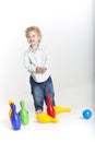 Toddler is bowling Royalty Free Stock Photo