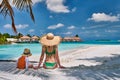 Toddler boy on beach with mother Royalty Free Stock Photo