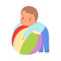 Boy hugs a huge ball. Vector illustration on a white background.