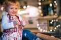 Toddler boy making gingerbread cookies at home. Royalty Free Stock Photo