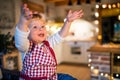 Toddler boy making gingerbread cookies at home. Royalty Free Stock Photo