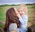 Toddler boy with mother