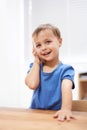Toddler, boy and phonecall at home, playing and communication with technology. Happiness, calling and conversation for Royalty Free Stock Photo