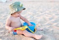 Toddler boy playing on the beach Royalty Free Stock Photo
