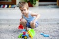 Toddler boy playing in the sand Royalty Free Stock Photo