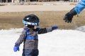 Toddler Boy Ready to Ski Dressed for Safety with Helmet & Harness Royalty Free Stock Photo